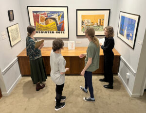 Randolph College students visit the Foyer Focus exhibition at the Maier Museum